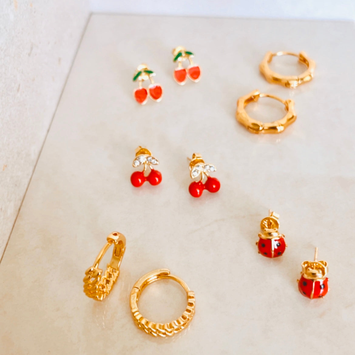 fun summer affordable gold earrings bamboo style hoops, lady bug studs, cherry earrings, cherry studs